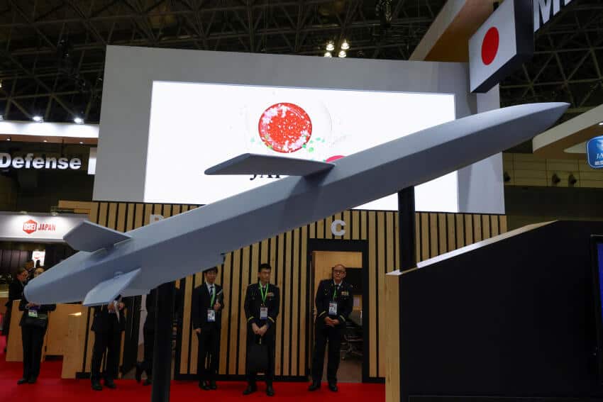 Japan flexes defense ambitions at arms show