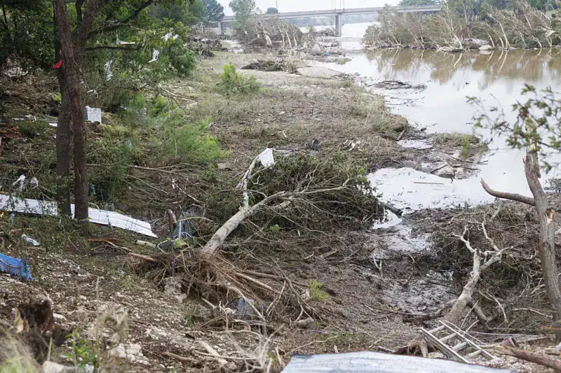 Did cuts by the US government play a role in the flood tragedy?