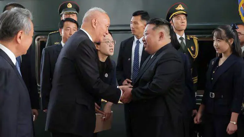 North Korea’s Kim arrives in Beijing with daughter to attend massive military parade