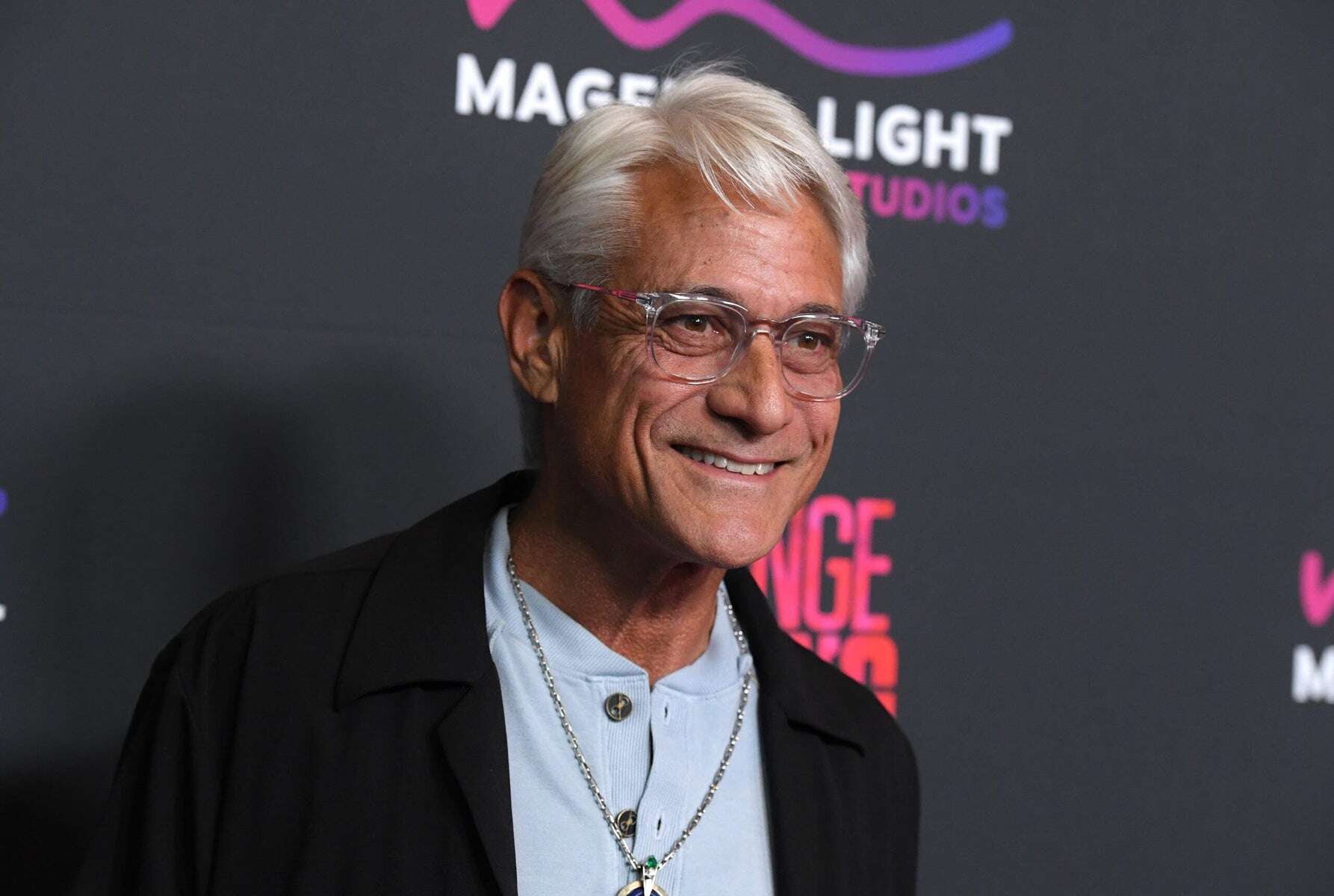 Olympic legend Greg Louganis of the United States sells his medals and house to begin a new life in Panama.