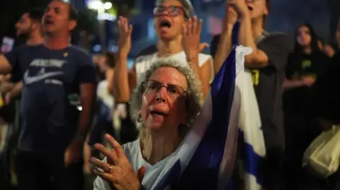 Israelis praise Trump at huge rally ahead of expected hostage release by Hamas in Gaza