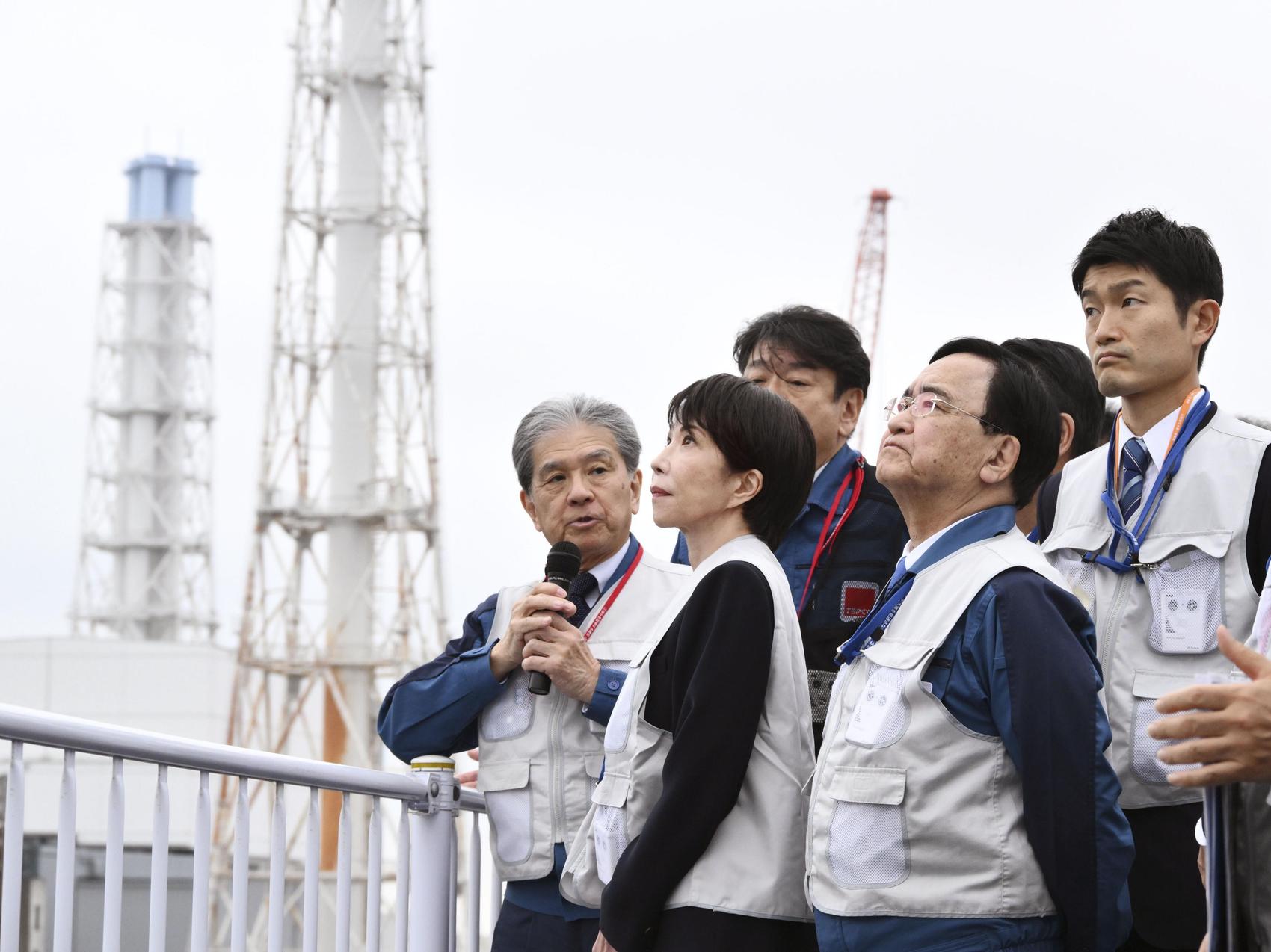 The PM of Japan promises to expedite government efforts to rebuild Fukushima.