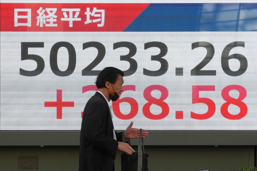 Asian stocks fluctuated as Wall Street approached its record high.