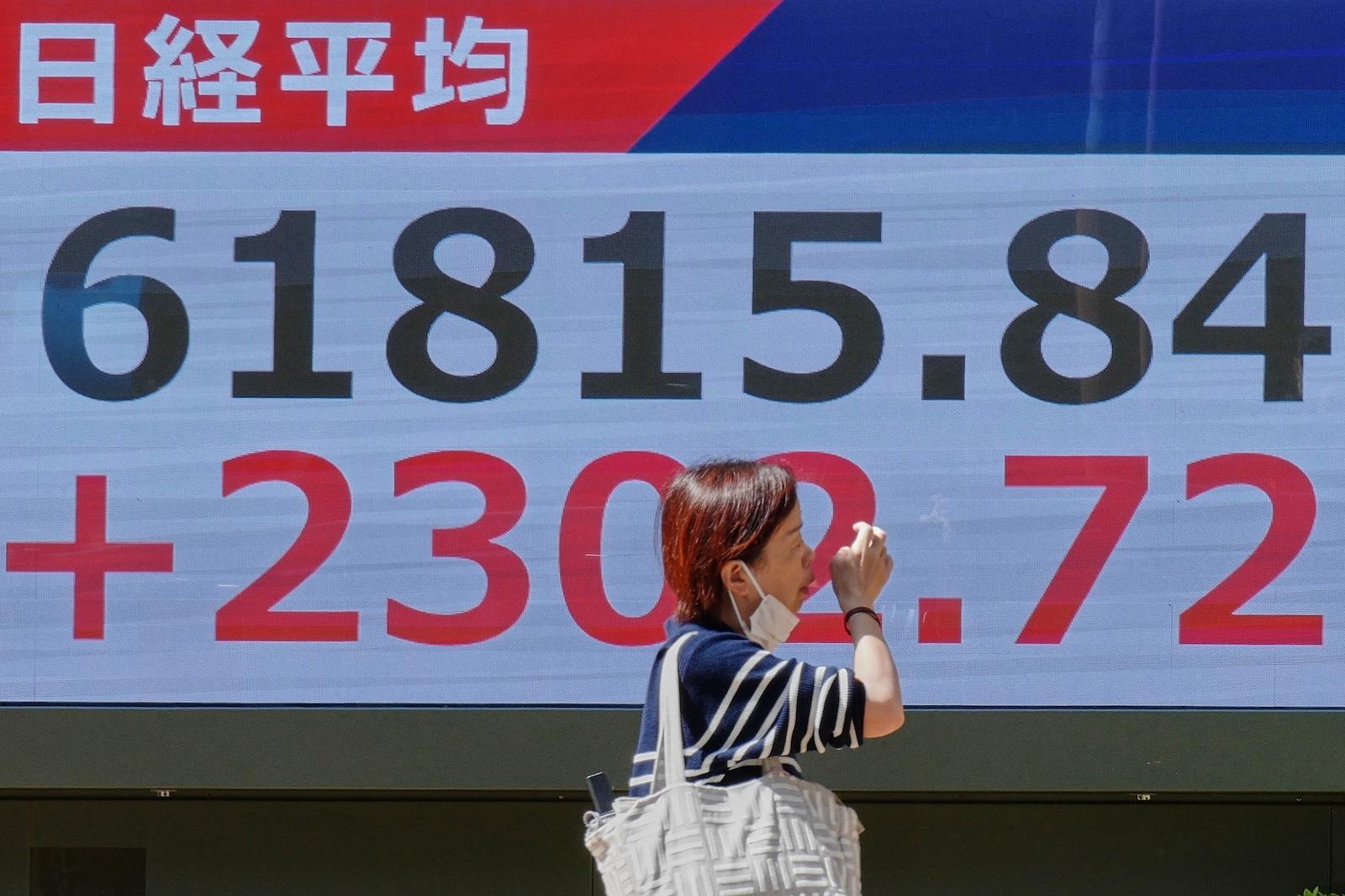 Nikkei ends at record high above 62,000, logging highest single-day point gain